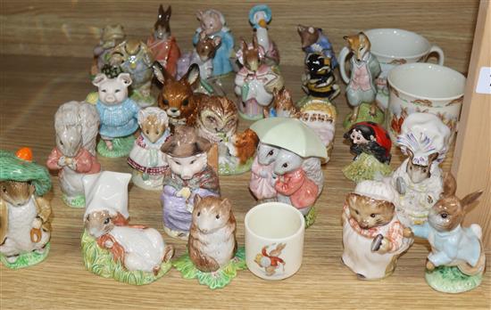 A quantity of Beatrix Potter figures, Royal Albert and Beswick with two Royal Doulton mugs and a similar figure Little Ballerina